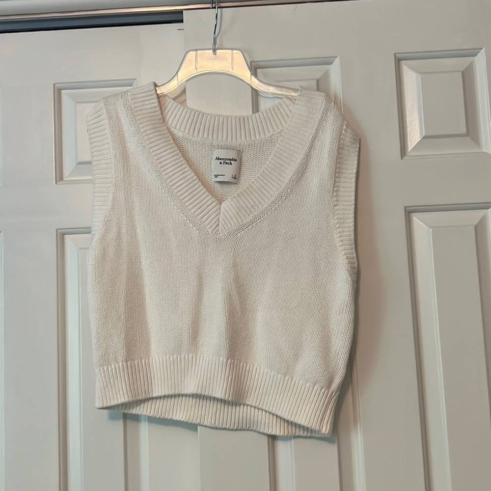 White sweater vest